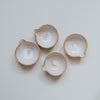 small white pouring bowls from above